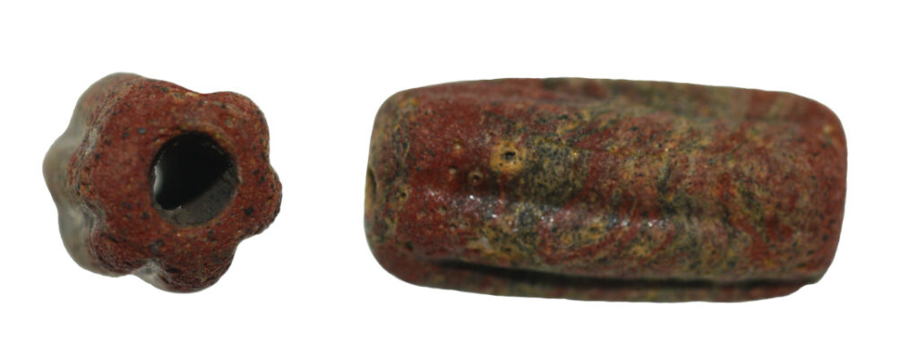 Red Anglo-Saxon bead from the site of Lyminge